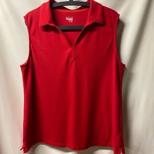 Red sleeveless “polo-type” tank- good tummy coverage.
